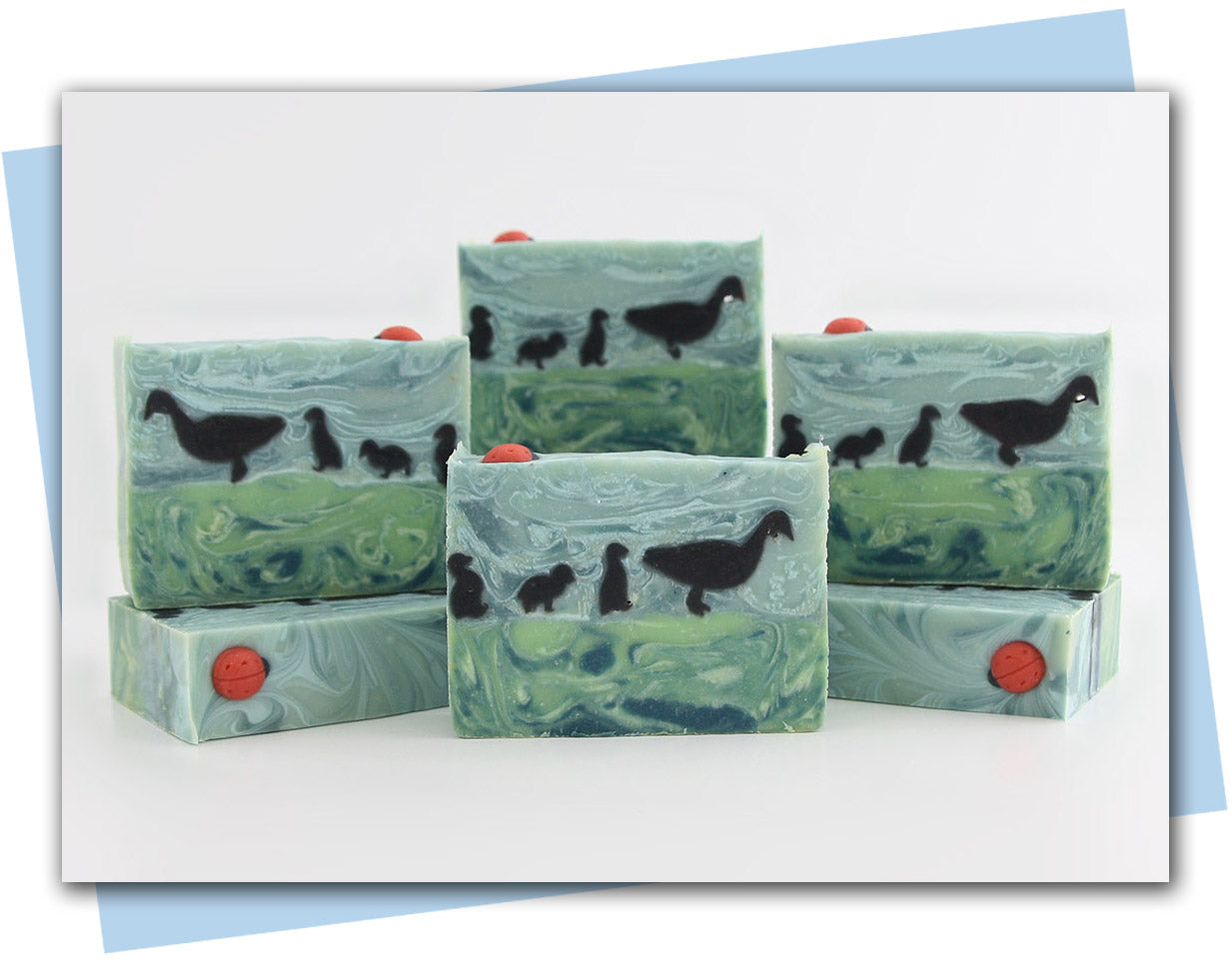 Green marbled soap bars with duck designs 