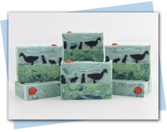 Green marbled soap bars with duck designs 