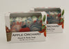 Bars of soap in custom packaging with apple and swirl design