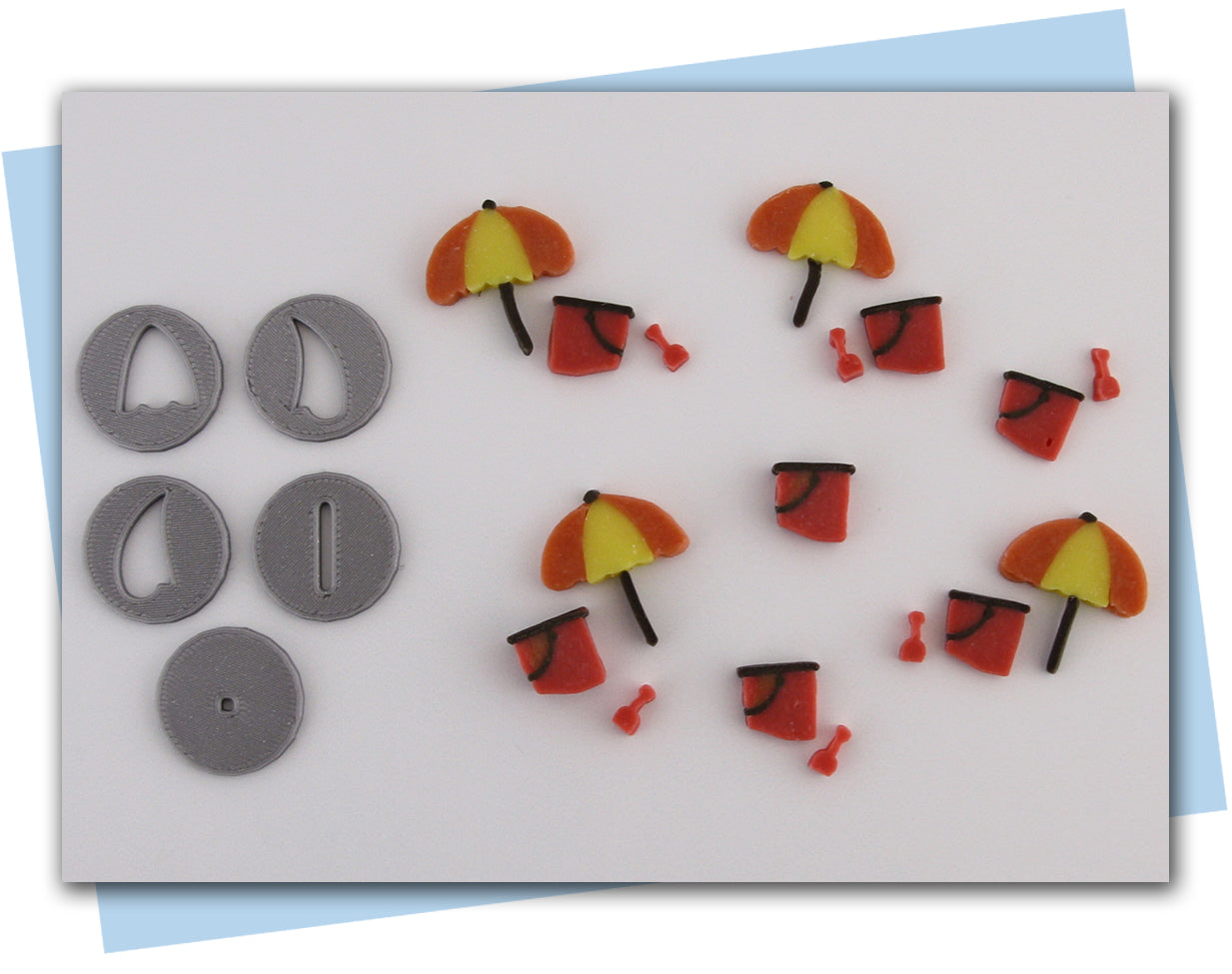 beach umbrella, pail, and shovel extruder disc soap embeds