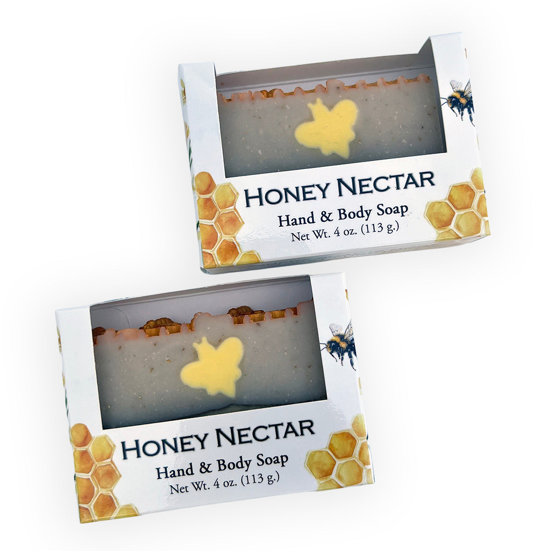 Two boxed bars of Honey Nectar Hand & Body Soap shown on a white background, with the soap visible through clear windows and a yellow bee decoration on each bar.
