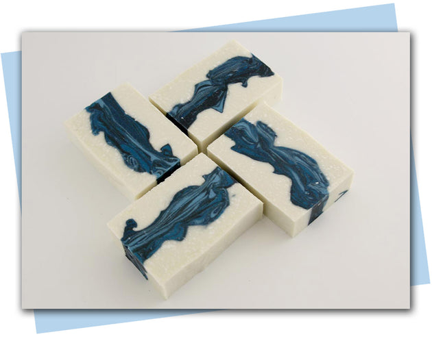 Three layers soap with white on the two out side layers and blue swirls on inside