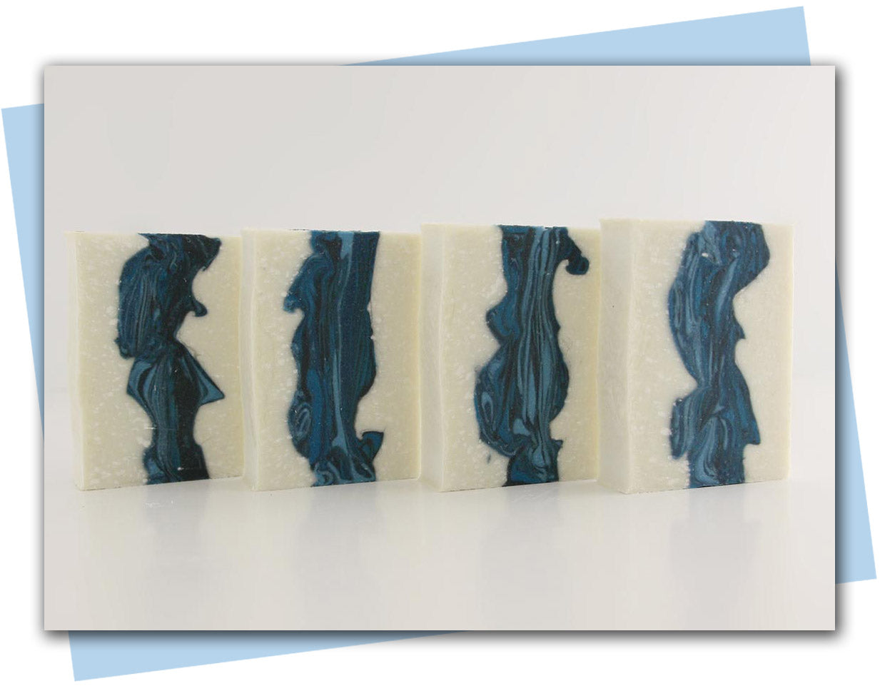 White bars with blue swirls - bars of soap