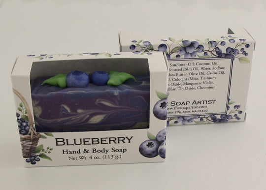 Bars of soap in custom packaging with blueberry and swirl design