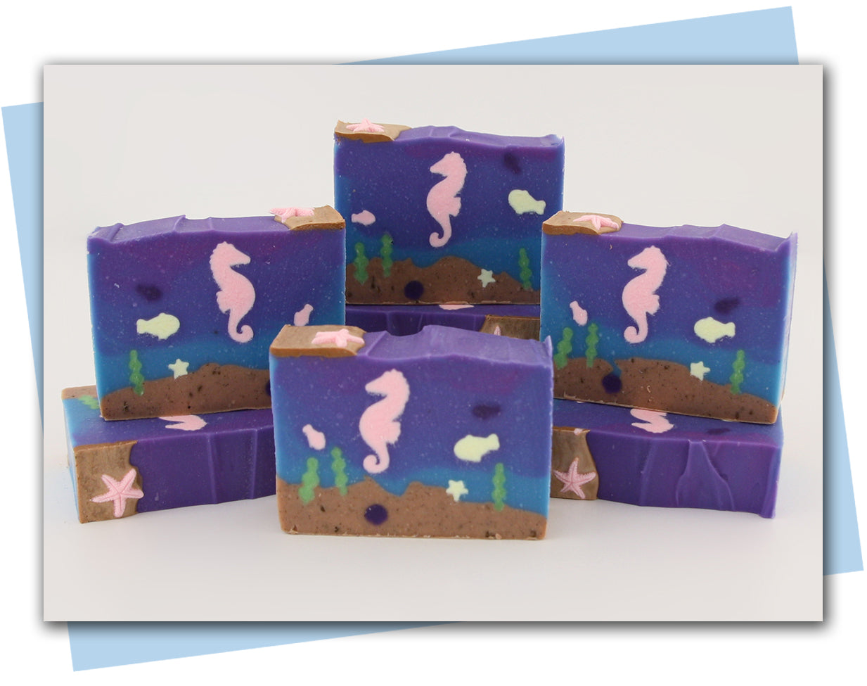 Ocean bottom scene soap with seahorse, fish, and shells.