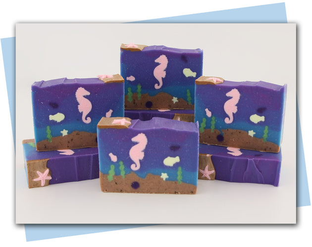 Ocean bottom scene soap with seahorse, fish, and shells.