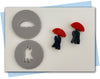 Couple standing under an umbrella extruder discs two disc in a set