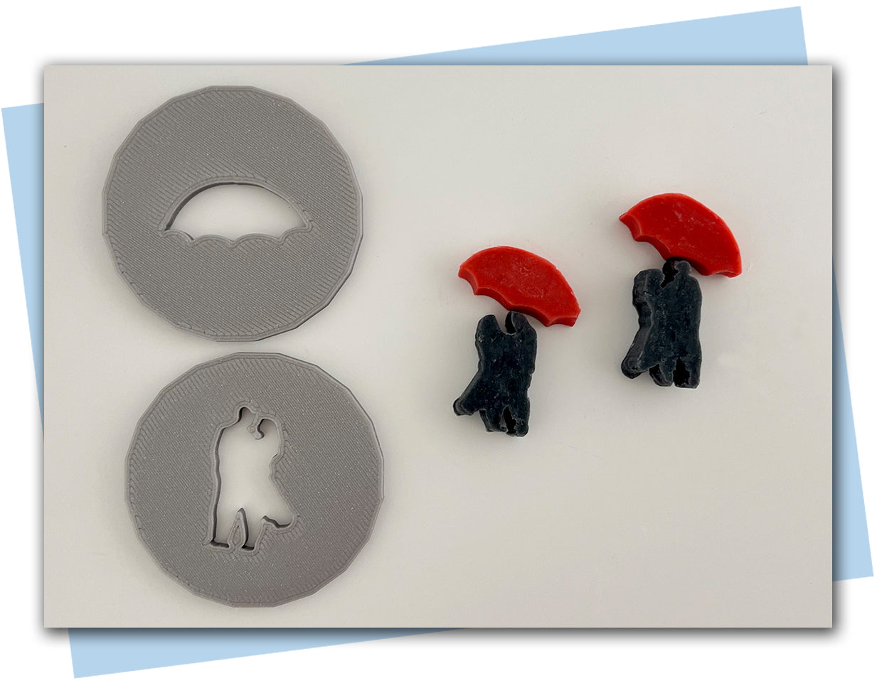 Couple standing under an umbrella extruder discs two disc in a set