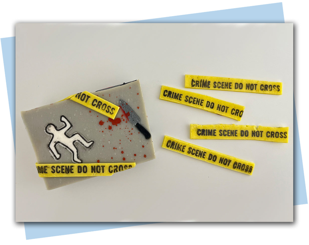 Mystery Stamp set included crime scene tape, a bloody handprint and footprints
