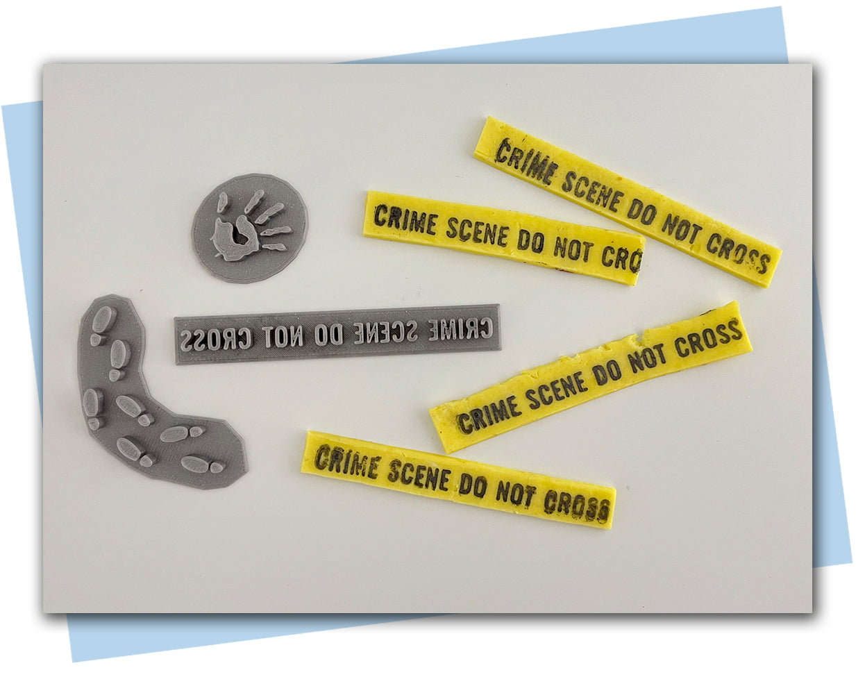 Mystery Stamp set included crime scene tape, a bloody handprint and footprints