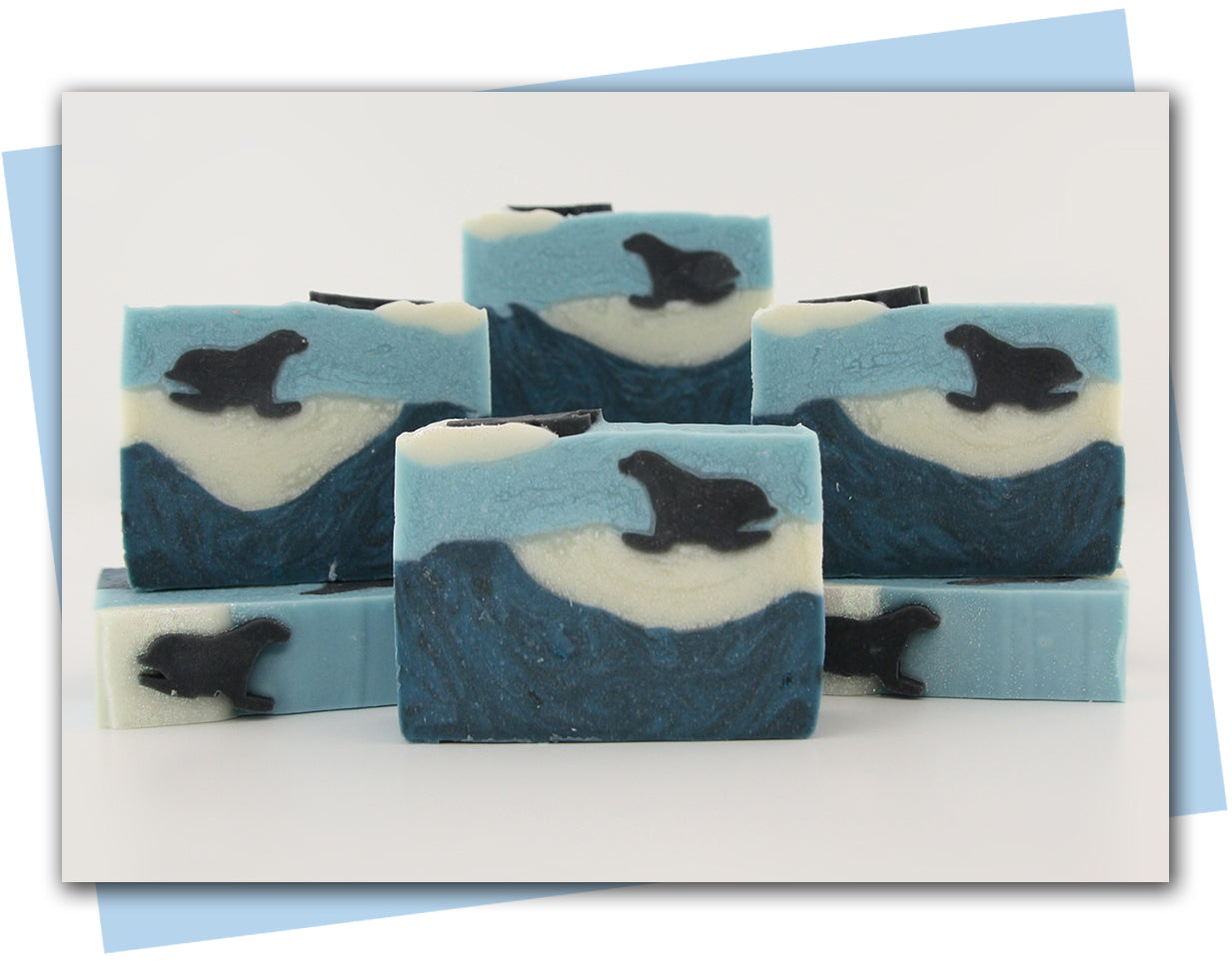 Bars of soap with a sea lion sitting on a floating block of ice ocean design