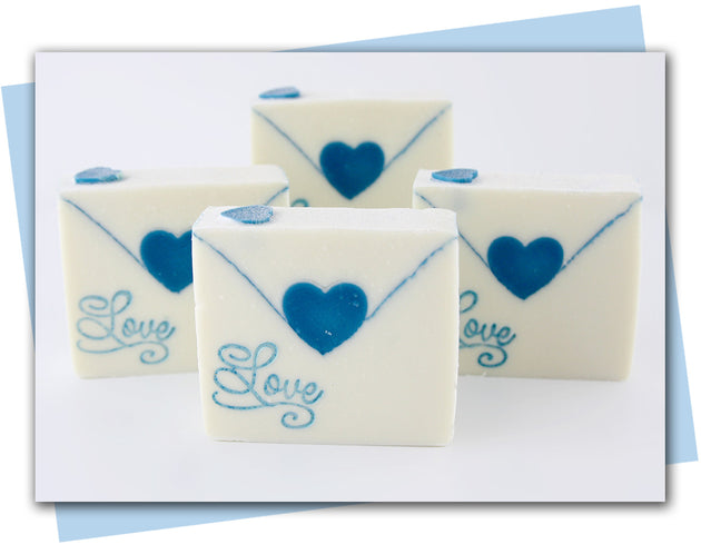 Soap scraper that creates a V envelope scrape.