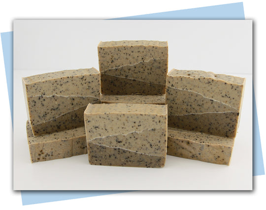 bars of soap in varying shades of brown with coffee grinds