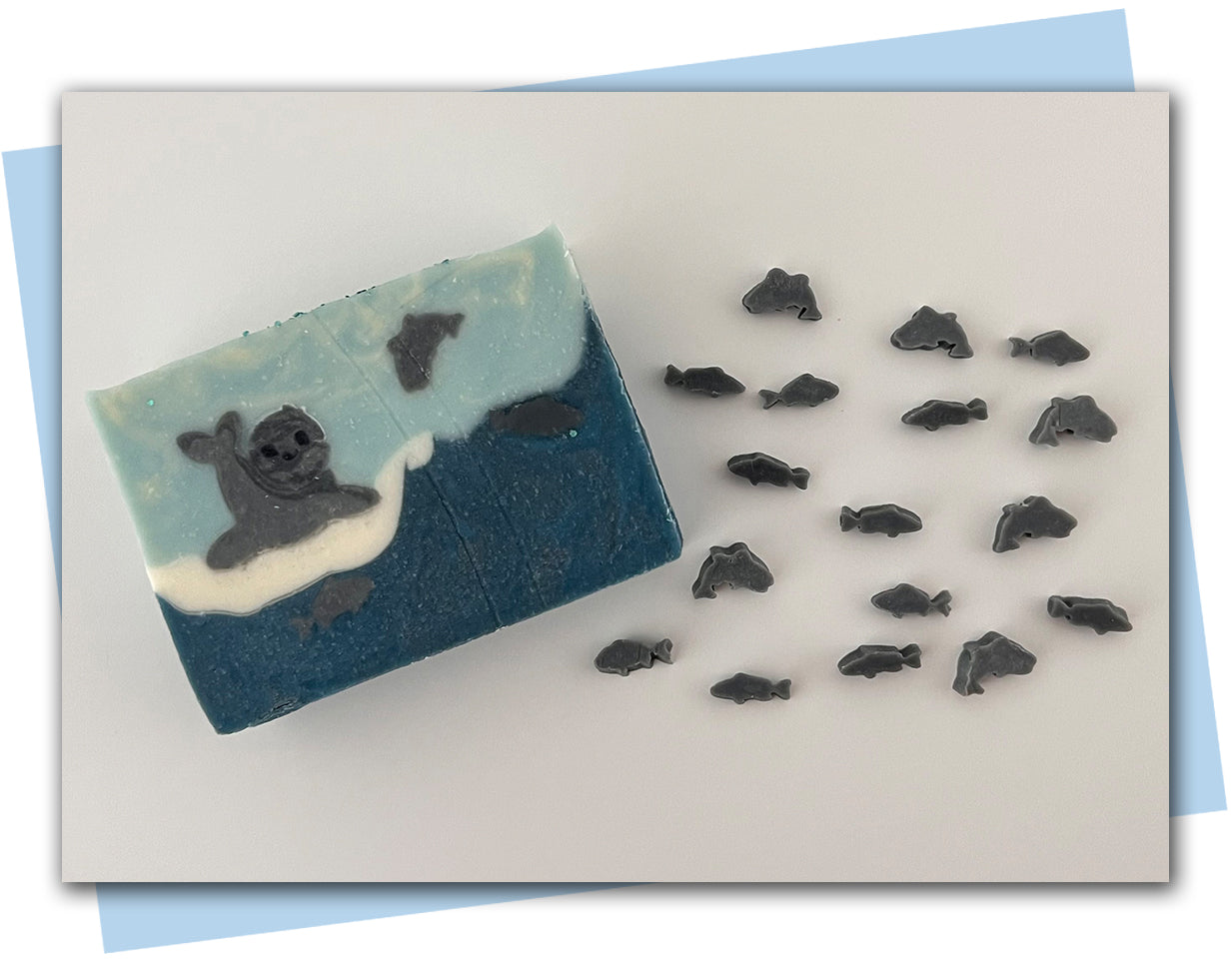 set of three fish extruder discs swimming in ocean