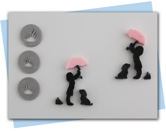 Girl holding umbrella over her head with dog at her feel extruder disc set and tuff or grass discs