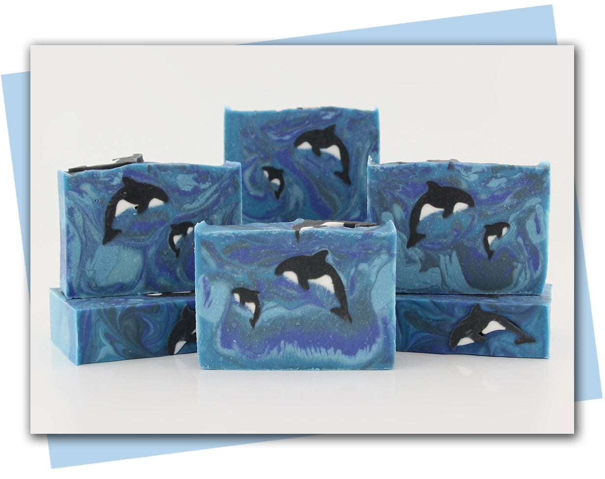 Momma and baby orca swimming in an ocean design bars of soap