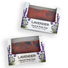 Two packaged bars of lavender hand and body soap shown on a white background, with the soap visible through clear windows in white boxes decorated with purple lavender illustrations.