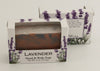 Bars of soap in custom packaging with rose clay and indigo powder swirl design