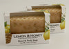 Bars of soap in custom packaging with lemon peel and a honey comb top design