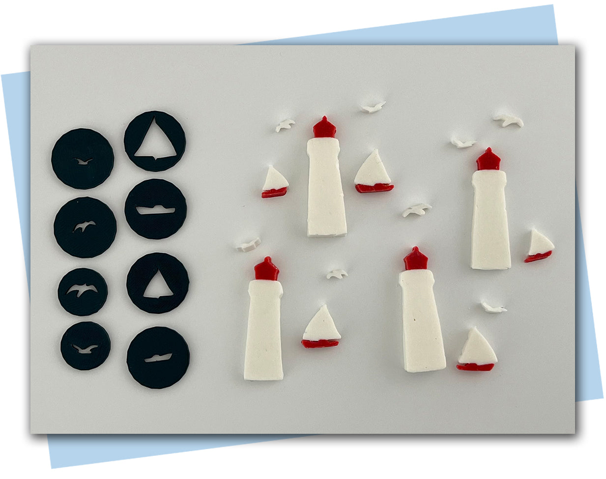 Lighthouse, sailboat, and seagull extruder discs