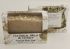 Bars of soap in custom packaging with oatmeal and milk brown bar design