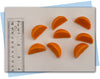 Orange slices soap embellishments with ruler for scale

