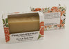 Bars of soap in custom packaging plan orange bar made with milk and no color added