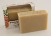 Bars of soap in custom packaging plan orange bar made with milk and no color added