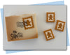 Holiday postage stamp extruder discs gingerbread man