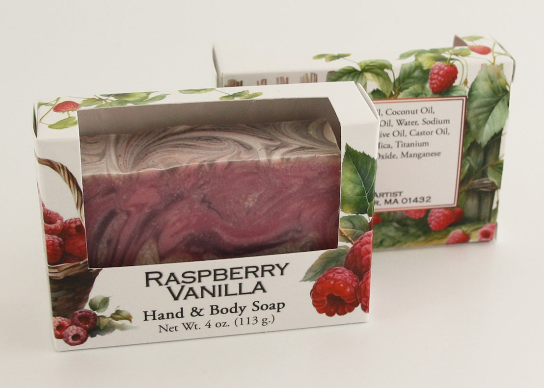 Bars of soap in custom packaging with purple, pink, and white swirl design