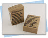 Two cardboard boxes labeled 'Romance' with text on a light background