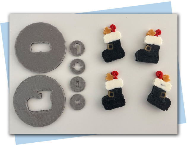 Santa boot with candy cane and gingerbread extruder discs and present extruder discs