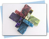 Blue flower tops with blue and black ombre swirl bars of soap