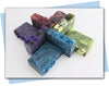 plum ombre flowers in a plum to black ombre swirled bars of soap