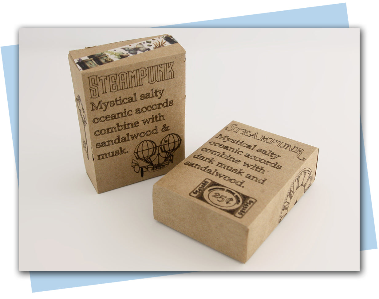 Two cardboard boxes with 'Steampunk' text and design on a light background