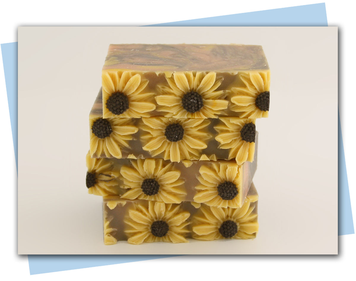 yellow orange brown swirl with sunflowers on top bars of soap