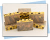 yellow orange brown swirl with sunflowers on top bars of soap