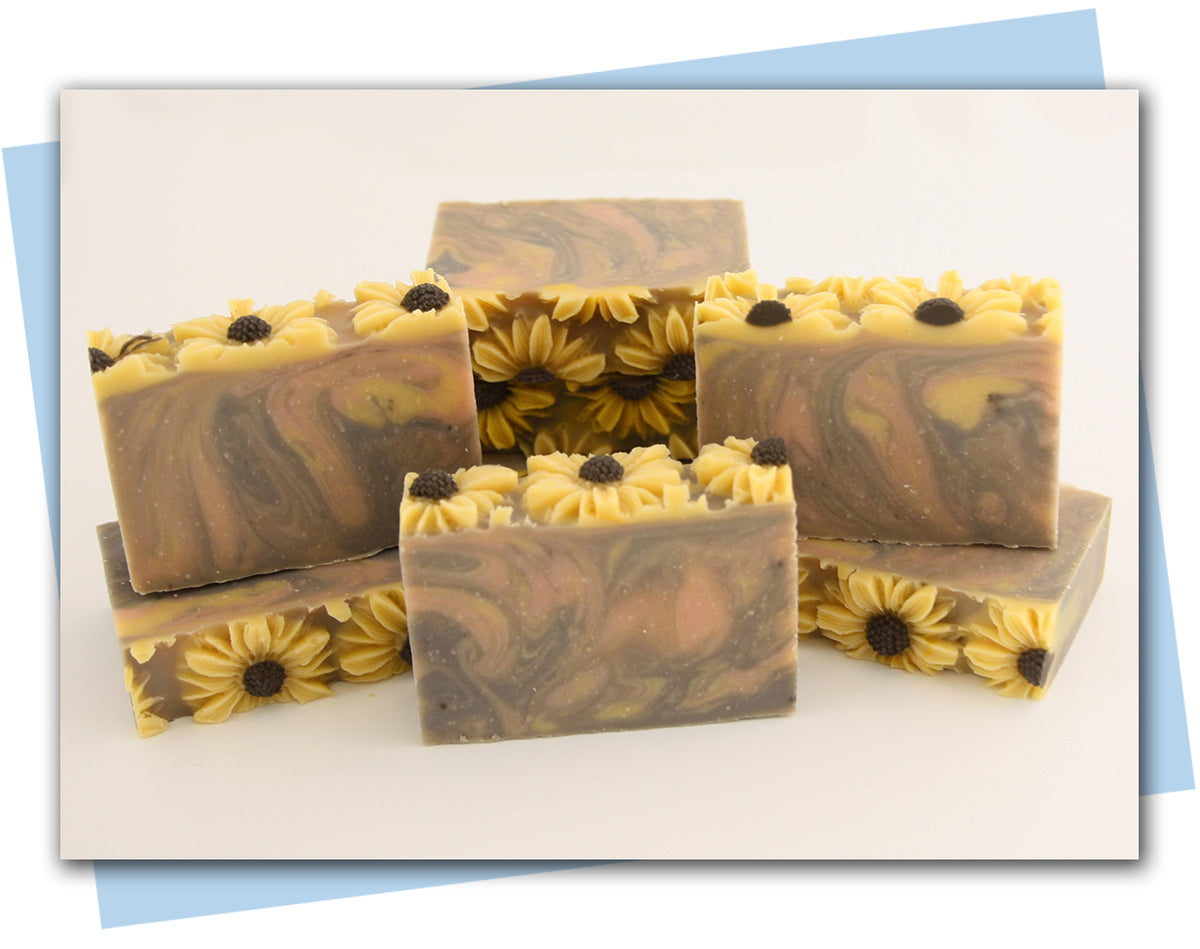 yellow orange brown swirl with sunflowers on top bars of soap