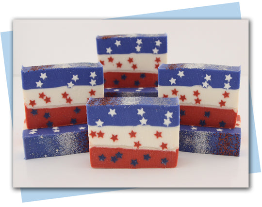 American flag inspired soap with layers of red white and blue and stars in each layer - bars of soap