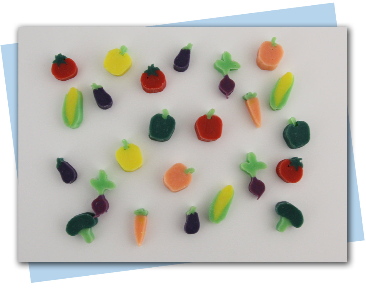 vegetable extruder discs: corn, carrot, pepper, eggplant, radish, broccoli, tomato extruder discs
