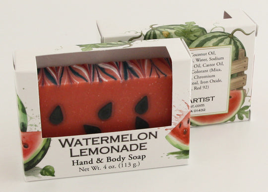 Bars of soap in custom packaging made to look like a watermelon with green bottom layer and black seeds in the pink layer