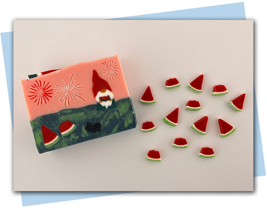 Watermelon slice extruder disc: one a wedge slice the other a slice with a bite taken out of it.