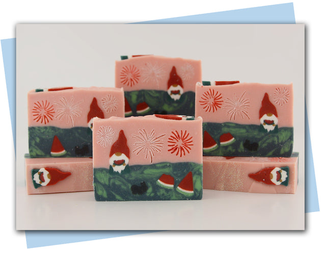 Gnome holding a watermelon with watermelon and ant embed and fireworks in the sky bar of soap