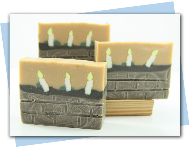 bar of soap with fireplace and candles