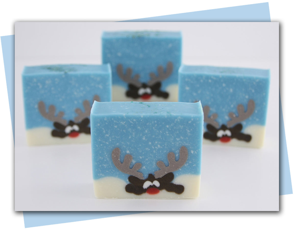 reindeer looking over mound of snow soap