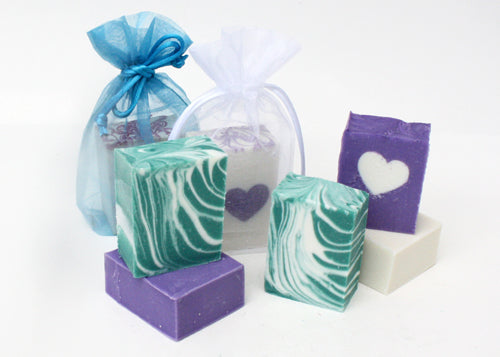 Half bars of soap with heart embed packaged in organza bag
